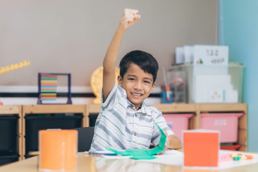 Students learning Singapore Math with teacher